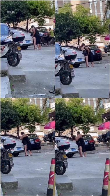 难道这么饥渴吗 大白天在马路上就摸上了 完全把路人当空气 在空调房舒舒服服不香吗